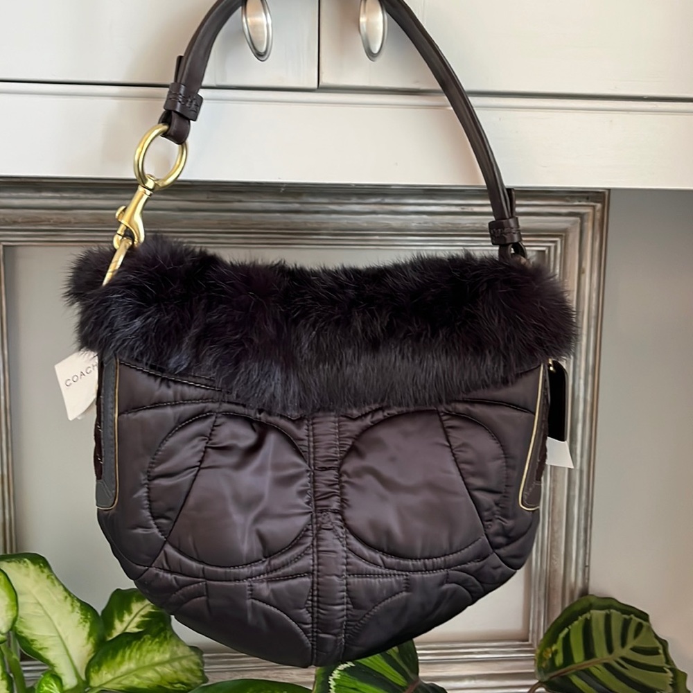 Coach bag with fur and suede details. NWT. Never carried. With dustbag.